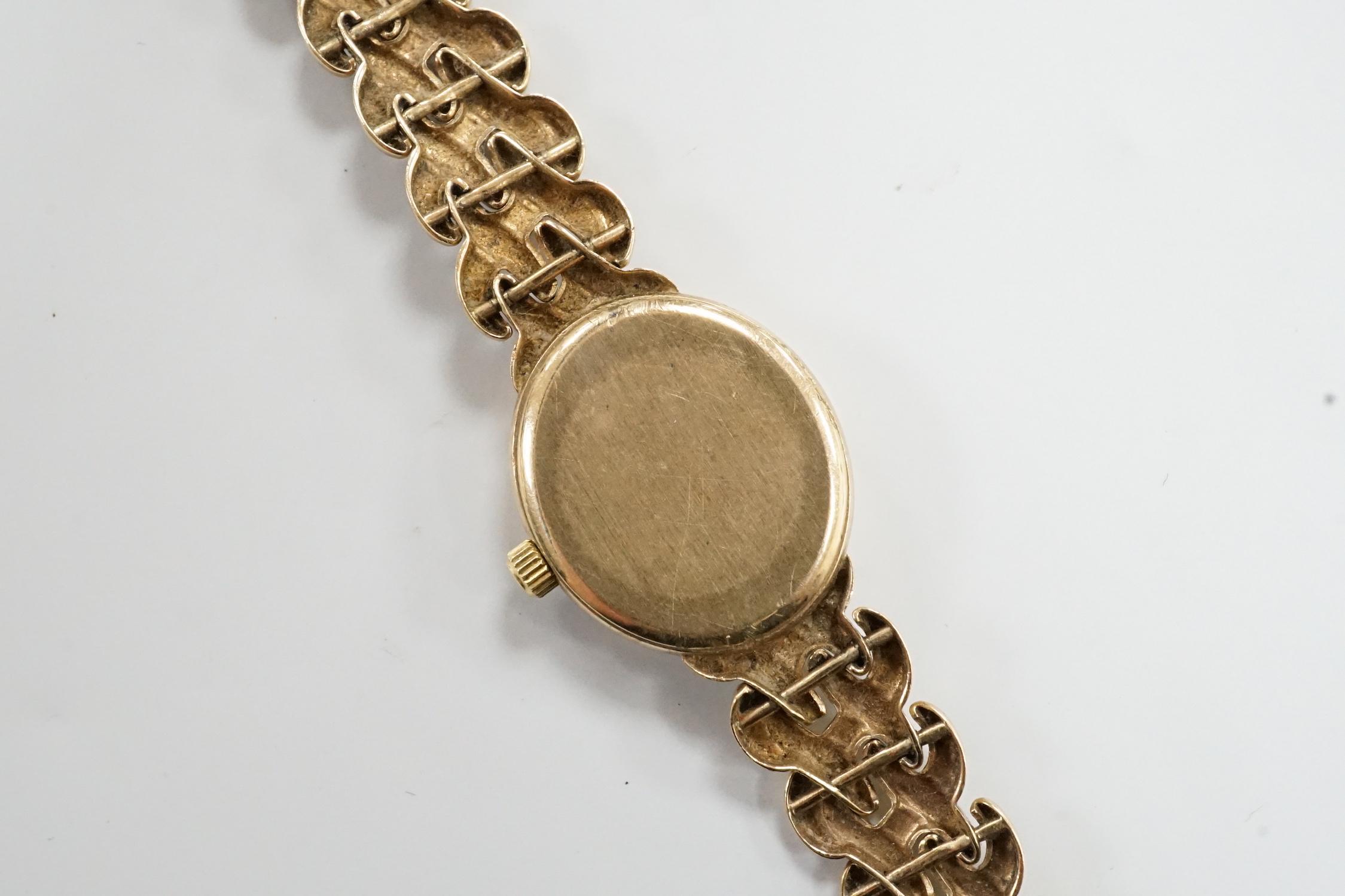 A lady's modern 9ct gold Rotary quartz wrist watch, on a 9ct gold Rotary bracelet, overall 17.5cm gross weight 16.5 grams.